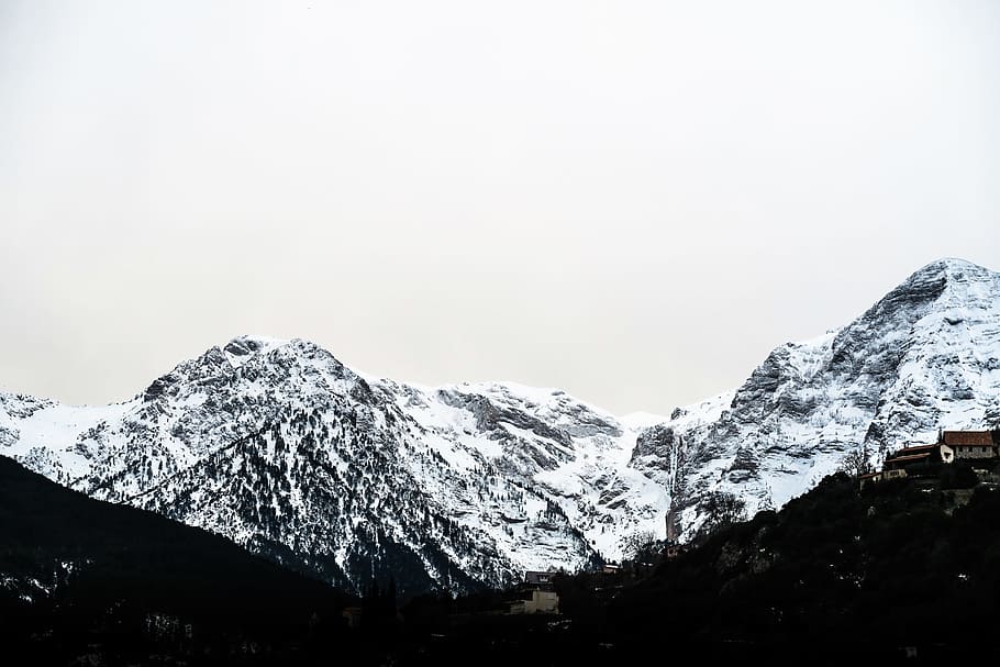 landscape photography of snow mountain, mountain alps during cloudy skies HD wallpaper