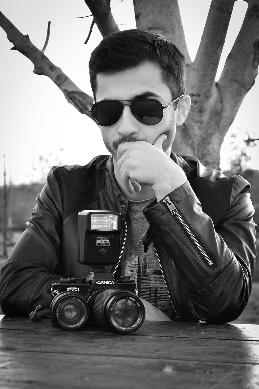 young man, old camera, glasses, serious, thinking, photo, boy HD wallpaper