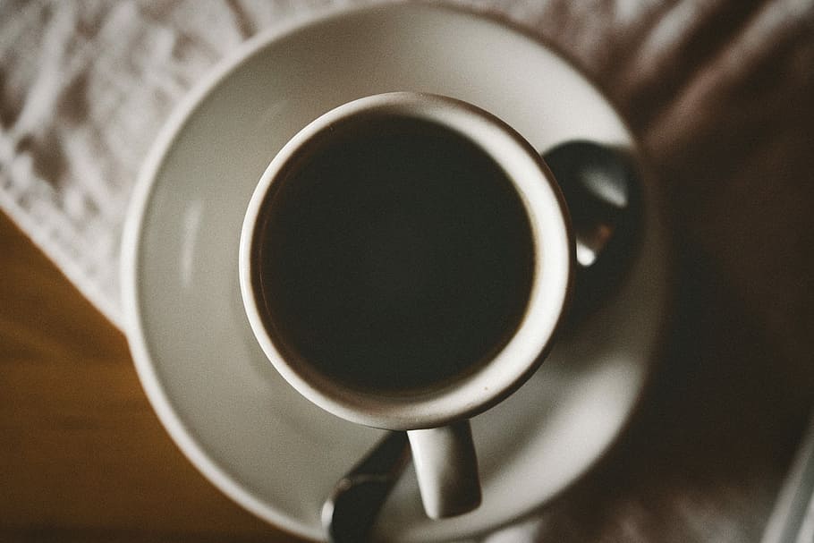white ceramic mug in flat lay photography, white ceramic cup with black coffee on brown table HD wallpaper