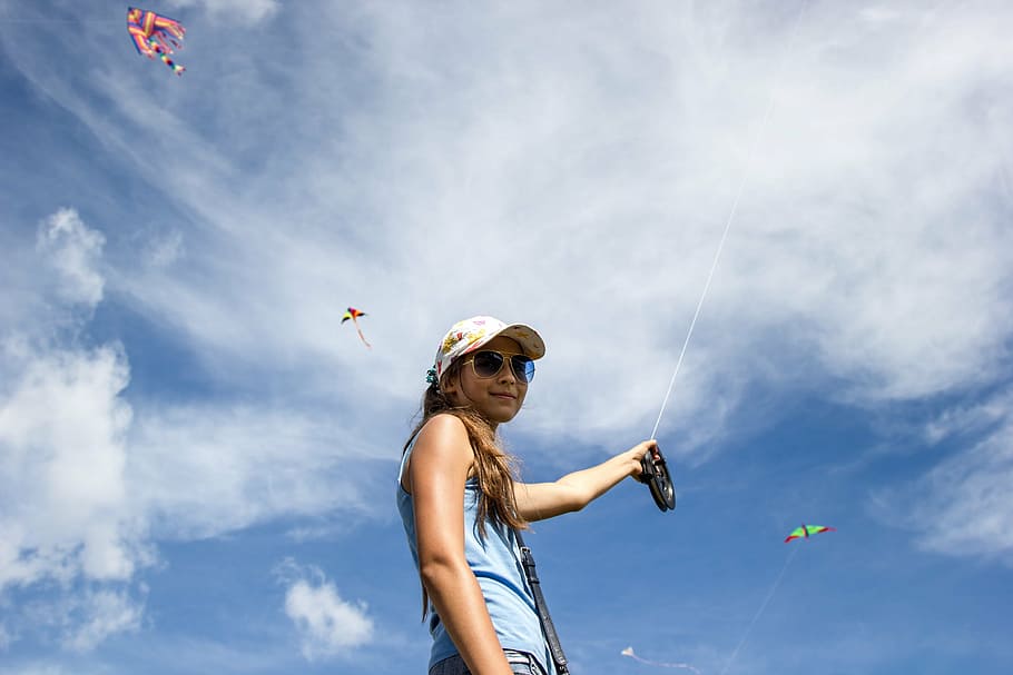 woman holding a wire with kite, childhood, sky, happiness, joy, HD wallpaper