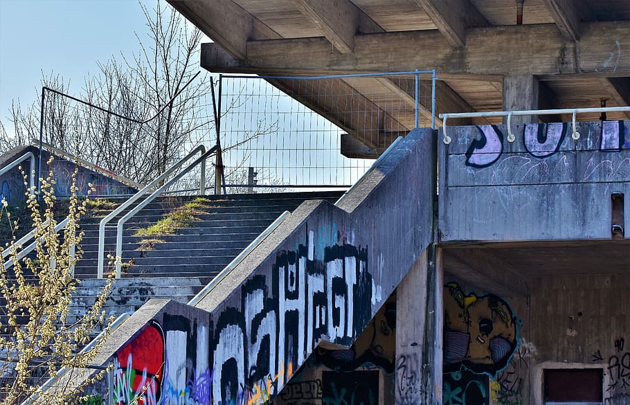 graffiti on concrete staircase, lost places, abandoned train station