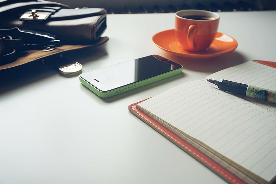 coffee, cup, desk, iphone, mug, notebook, paper, pen, purse HD wallpaper
