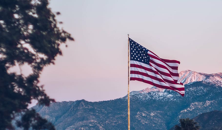 USA flag on pole across mountain, nature, landscape, sovereignty