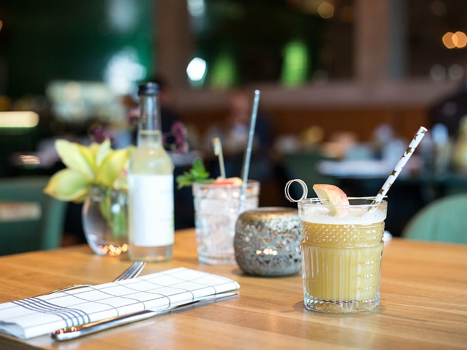 selective focus photography of drink placed near table napkin HD wallpaper