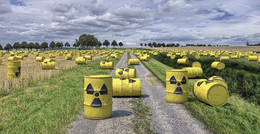 yellow metal tank containers on green grass field, nuclear waste, HD wallpaper