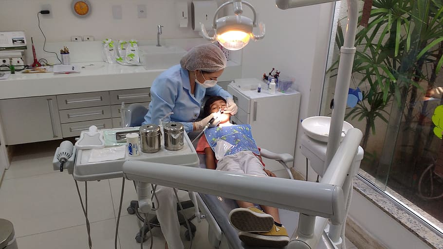 dentist cleaning a boys teeth, Child, Tooth, Dental Care, office