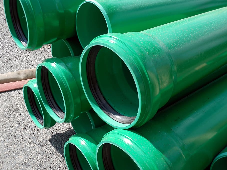 pipes, pipeline, construction material, site, green color, pipe - tube HD wallpaper