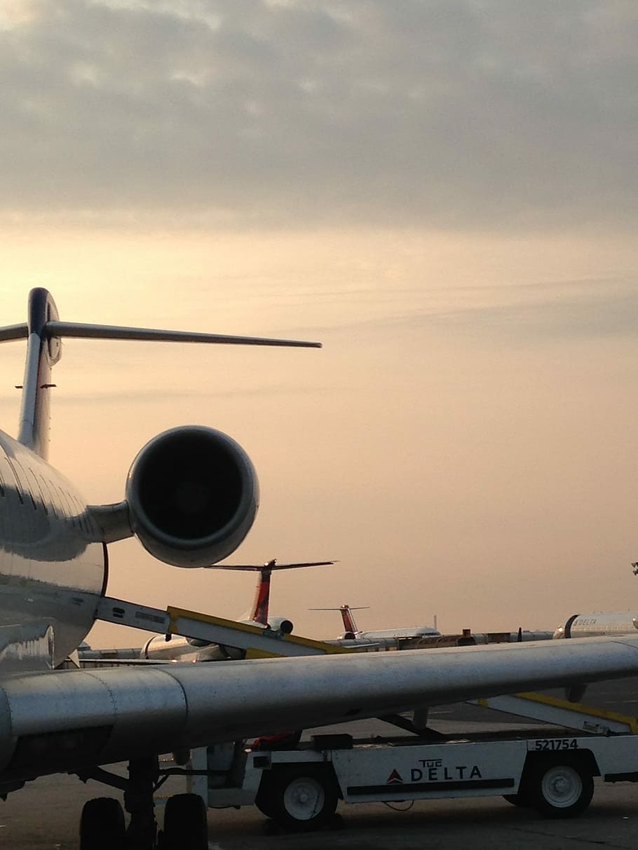 photo of white airliner on plane station, Airplane, Jet Engine HD wallpaper