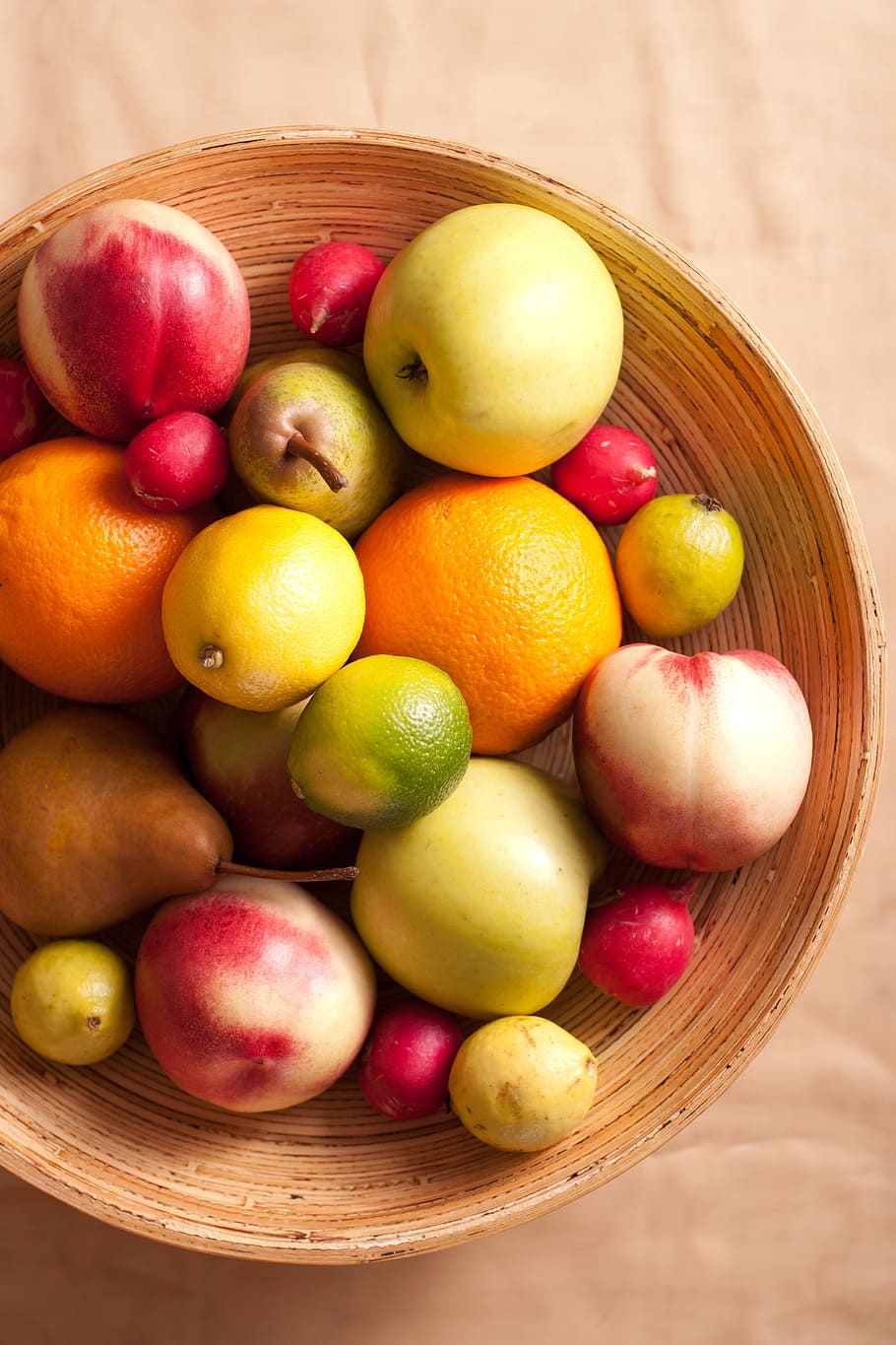 closeup photography of apple fruits, orange fruits, pear fruits, and lemons in brown rattan bowl HD wallpaper