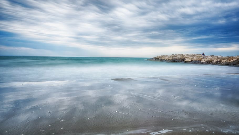 body of water near rock formation at daytime, sea, gewitterstimmung HD wallpaper