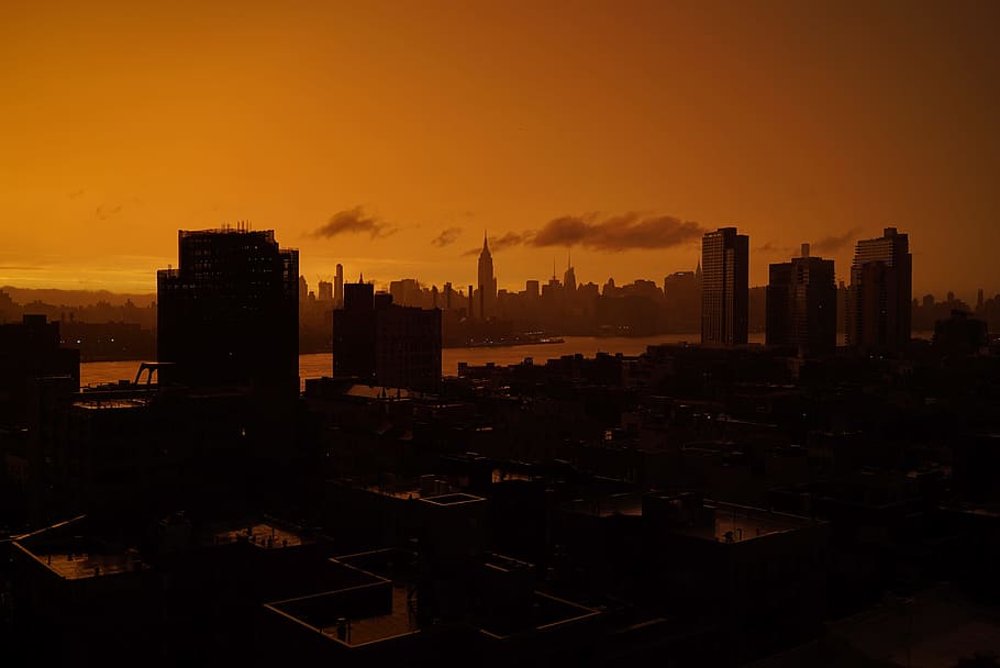 aerial photography of buildings, Orange, city, silhouette, sunset HD wallpaper