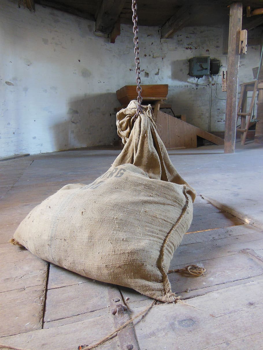 brown sack on chain near wall, old windmill, dyrhave mill interior HD wallpaper
