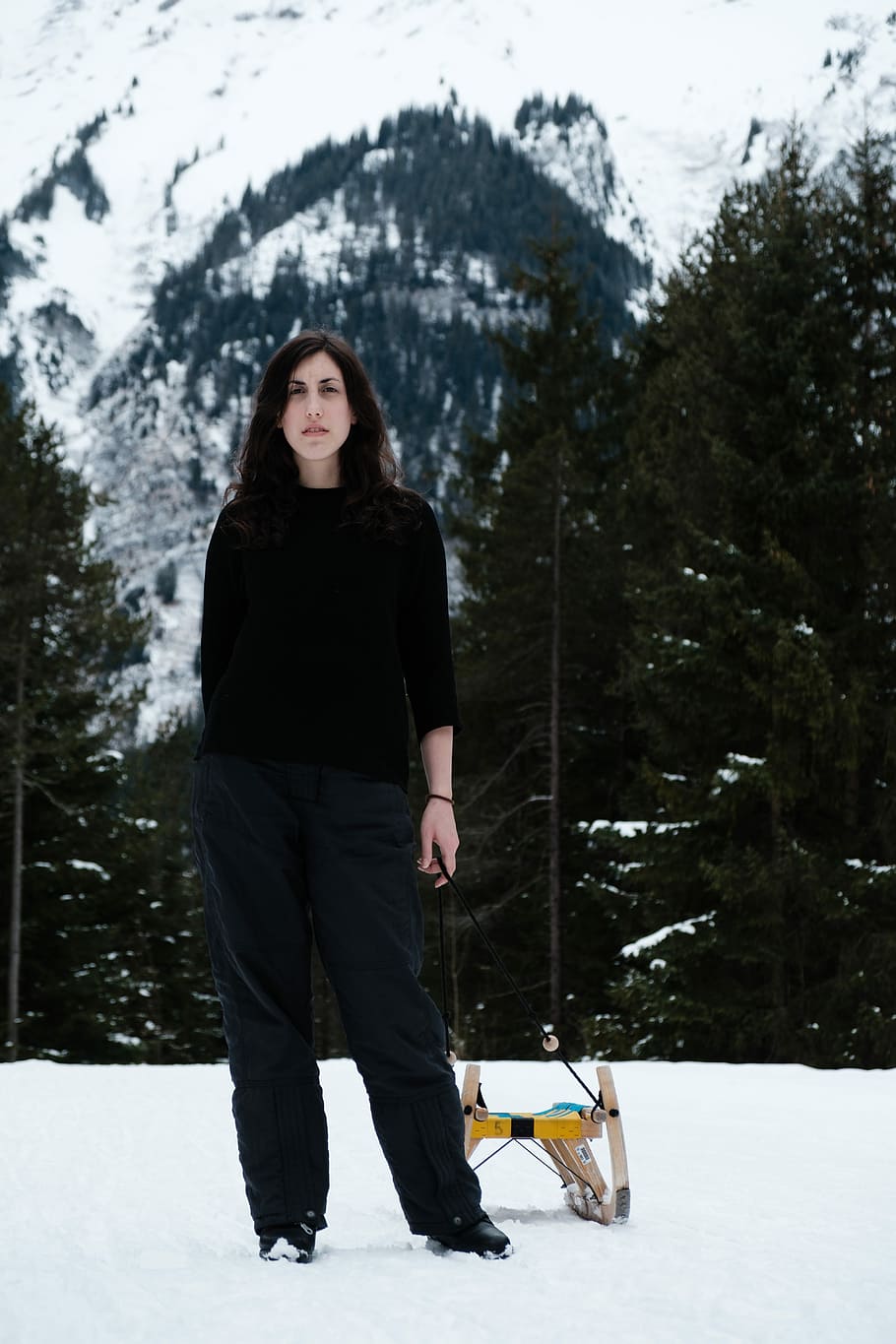 Sledge time, woman standing on the sow field, portrait, winter HD wallpaper