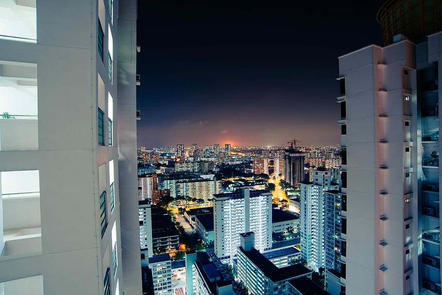 photo of high-rise building during nighttime , aerial view of city HD wallpaper