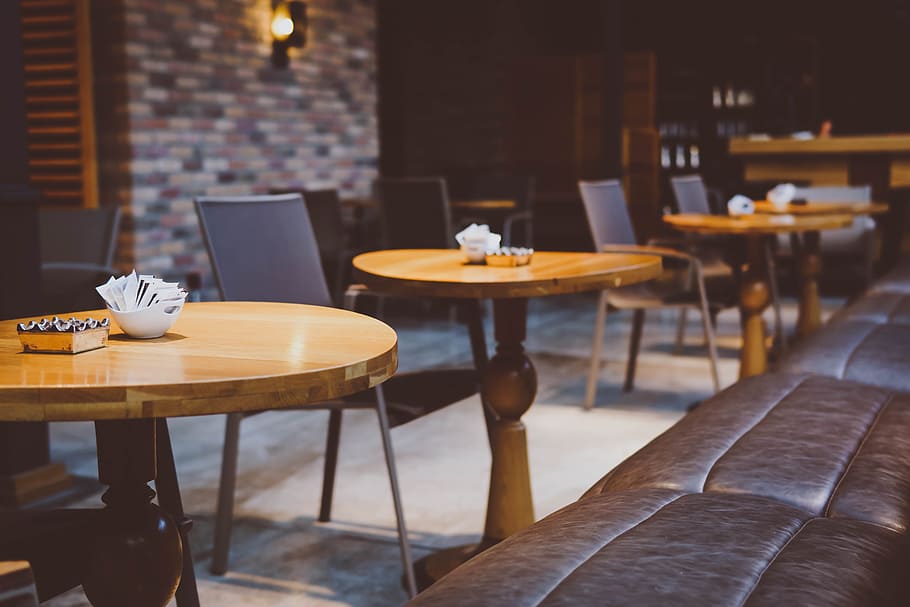 photography of brown pedestal table, white bowls on round brown wooden tables HD wallpaper