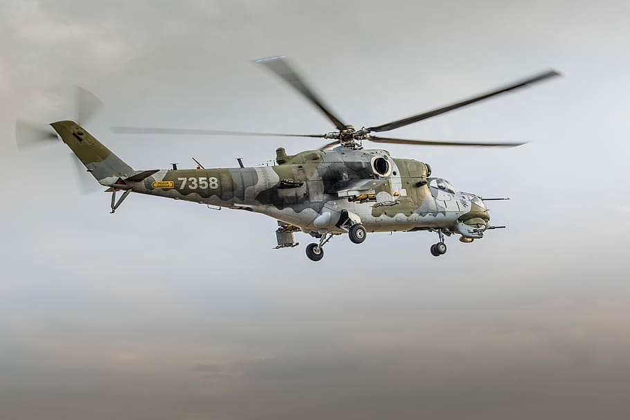 low angle photography of brown and gray helicopter, gray and green helicopter HD wallpaper