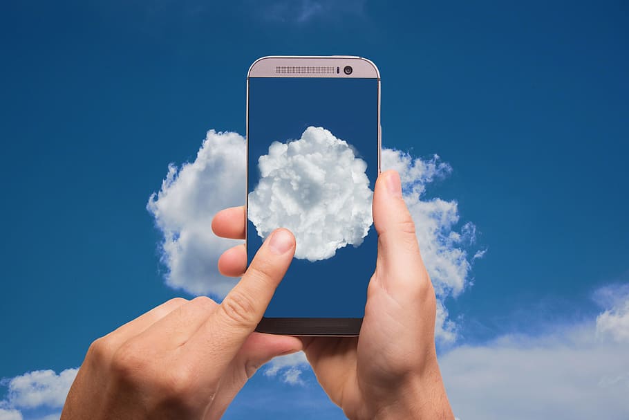 person taking photo using gray HTC One M8 smartphone, cloud, finger