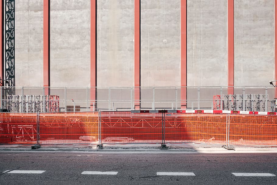 concrete road near building, photo of gray metal railings near road during daytime HD wallpaper