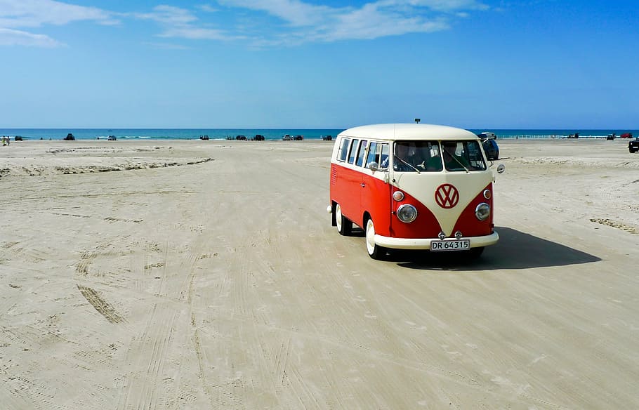 white and red Volkswagen van on road at daytime, gray, sand, near