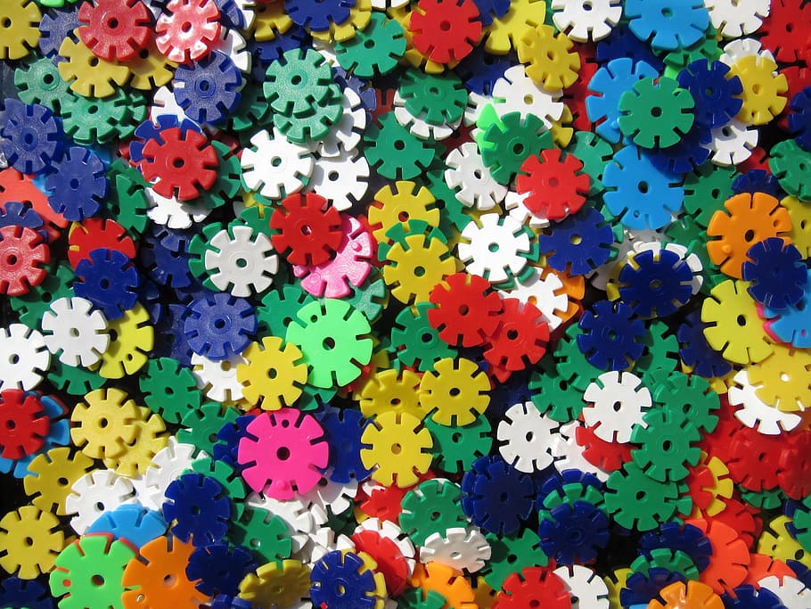 assorted-color puzzle toy lot, discs, colorful, toys, plastic
