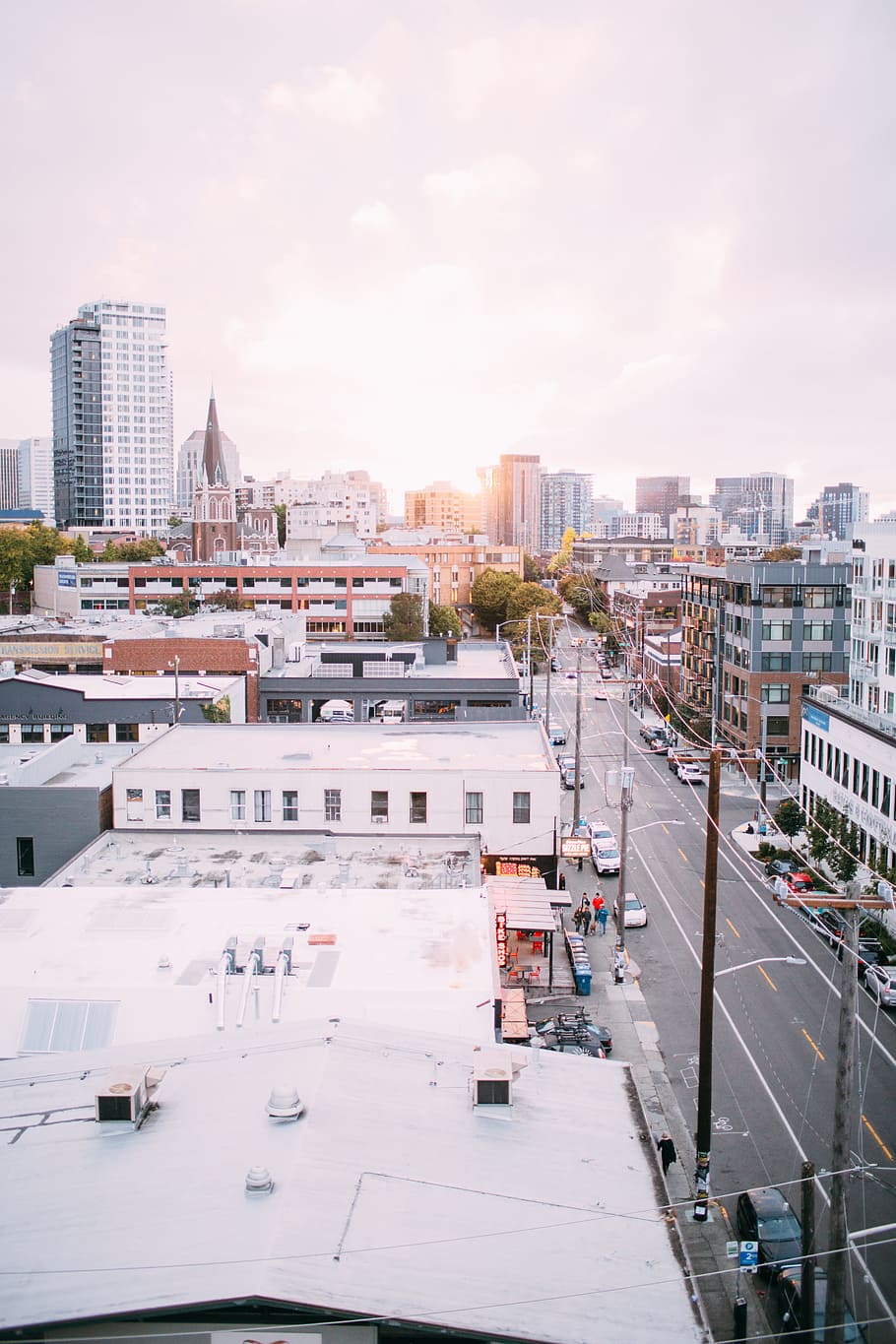 Rooftop shot of Capitol Hill road with city buildings and skyscrapers in background, aerial photography of buildings HD wallpaper