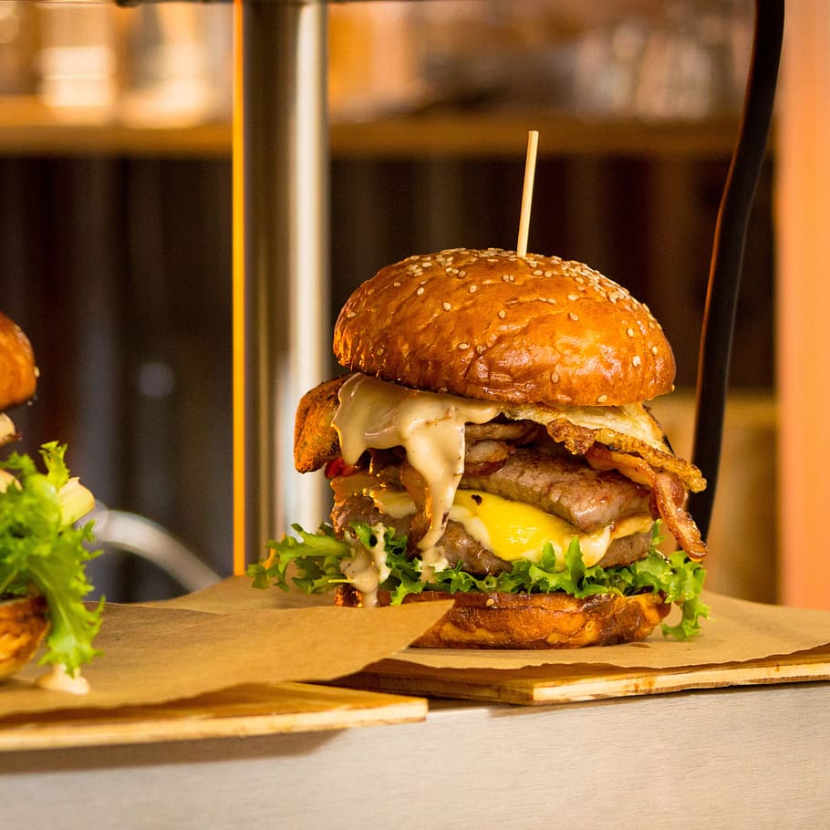 burger on top of paper, food, bun, hamburger, fast, meal, snack, HD wallpaper