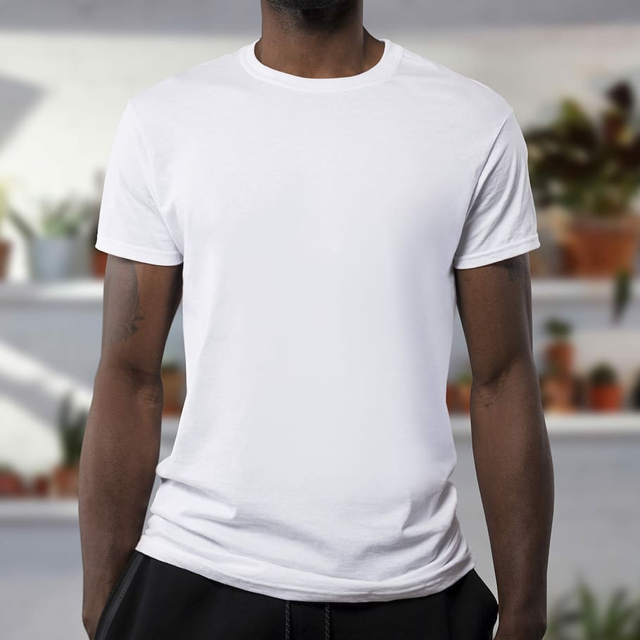 man wearing white crew-neck t-shirts, man wearing white crew-neck t-shirt and black sport shorts
