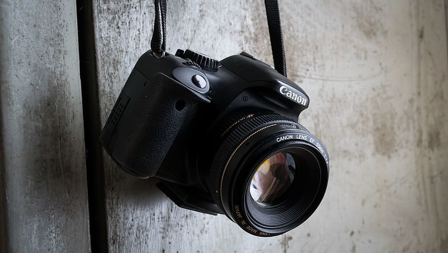 black Canon DSLR camera hanging on wall, photography, digital HD wallpaper