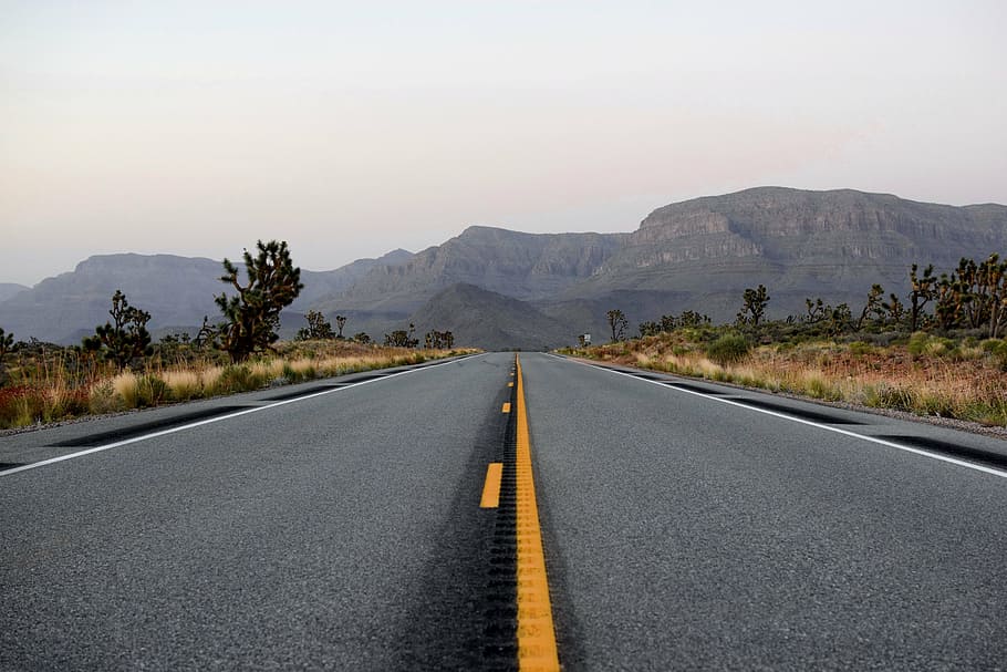 empty highway, asphalt, drive, grass, landscape, mountain, nature HD wallpaper