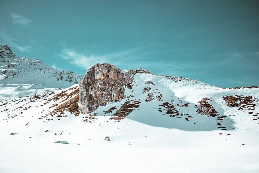 rock formation filled with snow, mountains under snow during daytime HD wallpaper