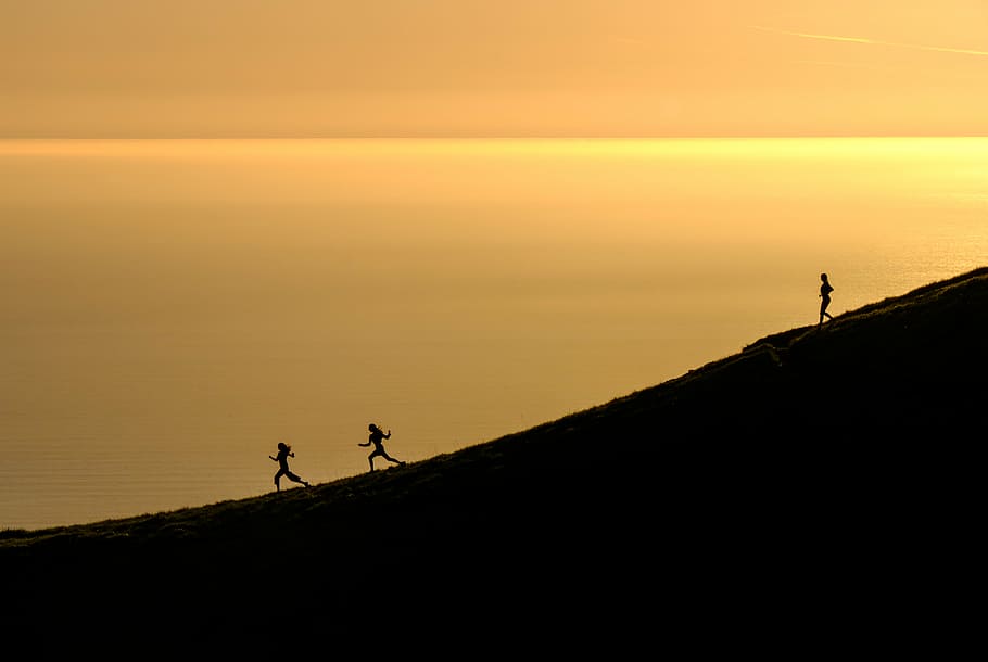 silhouette of three person near body of water at sunset, sea HD wallpaper