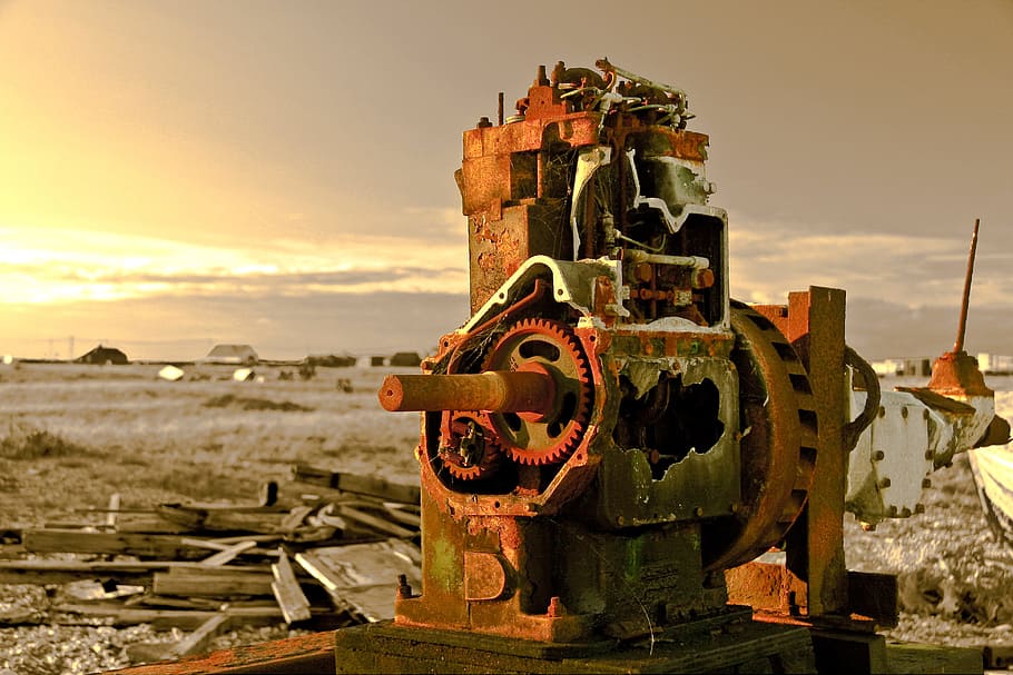 Landscape shot containing an old abandoned piece of machinery captured at sunset on the coast at Dungeness, Kent, England, HD wallpaper
