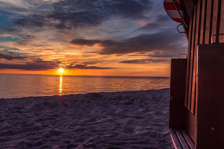 sunset, beach chair, clouds, sea, north sea, sand, coast, sky HD wallpaper