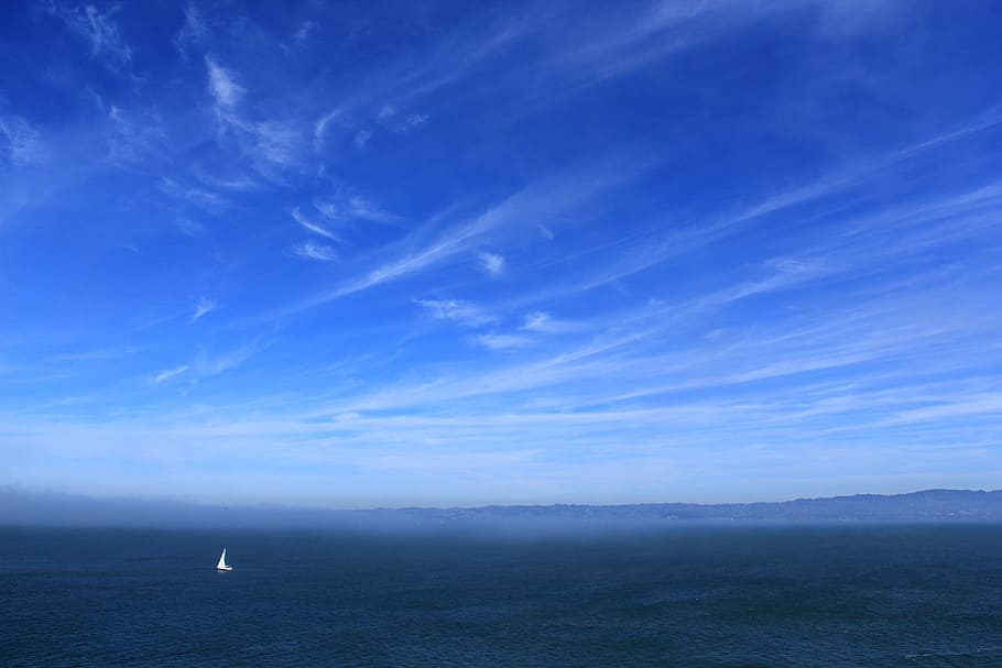 blue sea and sky horizon, white boat at the middle of sea under blue clouds HD wallpaper