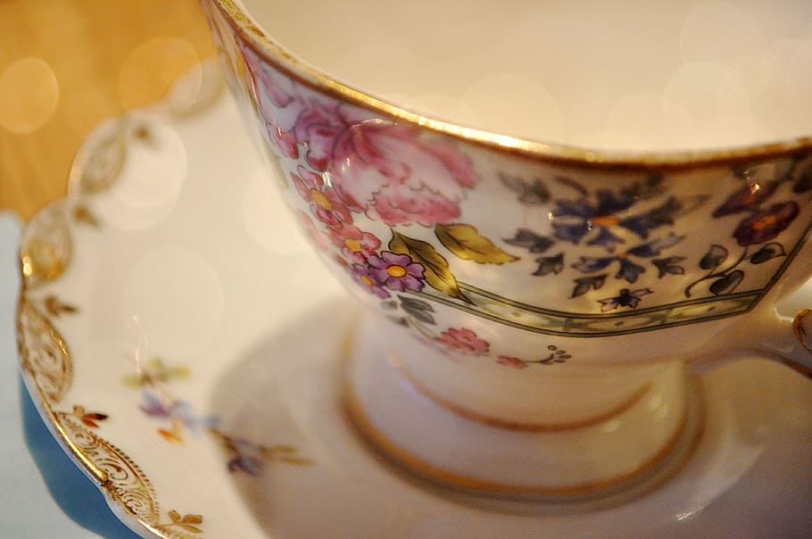 white and multicolored floral ceramic tea cup on white ceramic saucer HD wallpaper