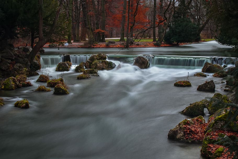 time lapse photography of river surrounded by red trees, water stream and trees photo HD wallpaper