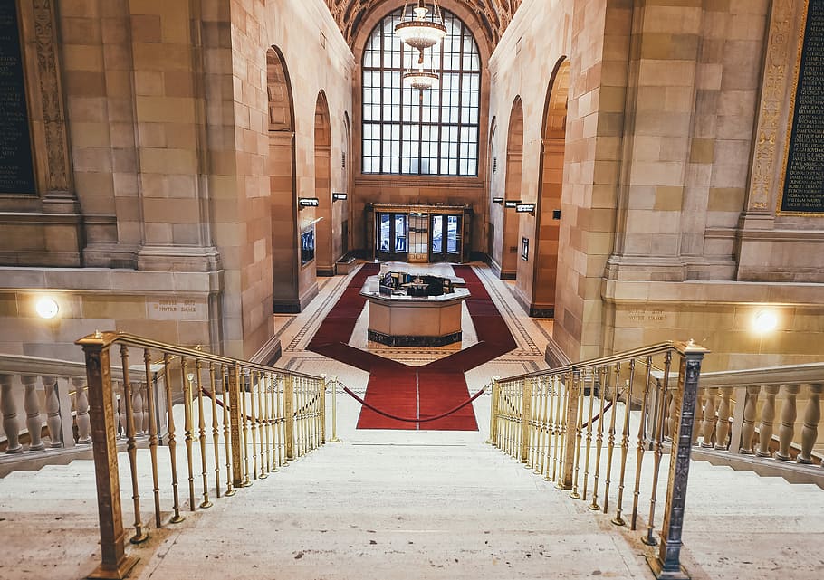 red carpet surrounds the reception desk, downstairs near pathway HD wallpaper
