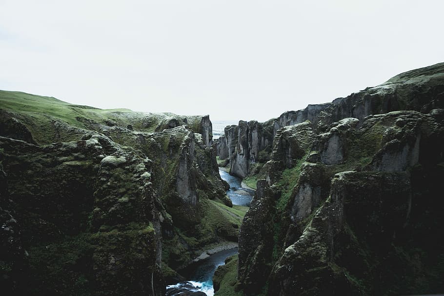 river flowing between two land forms, aerial view of river between cliffs HD wallpaper