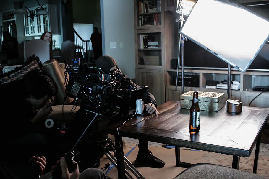 person sitting beside coffee table, set, filming, film set, light, HD wallpaper