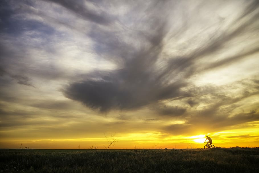 silhouette of person biking during sunset l, cycling, landscape HD wallpaper