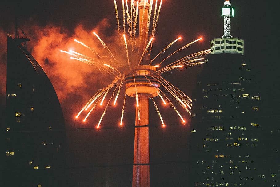 fireworks blasted from Space Needle unto the sky at night time HD wallpaper
