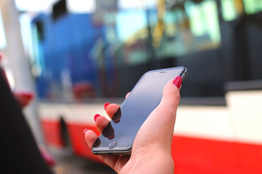 person holding space gray iPhone 6, apple, technology, bus HD wallpaper