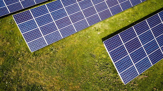 photo of three solar panels, blue solar panel on green field HD wallpaper