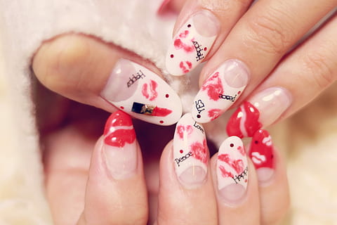 closeup photo of person's nails with red lips nail polishes, human Finger HD wallpaper