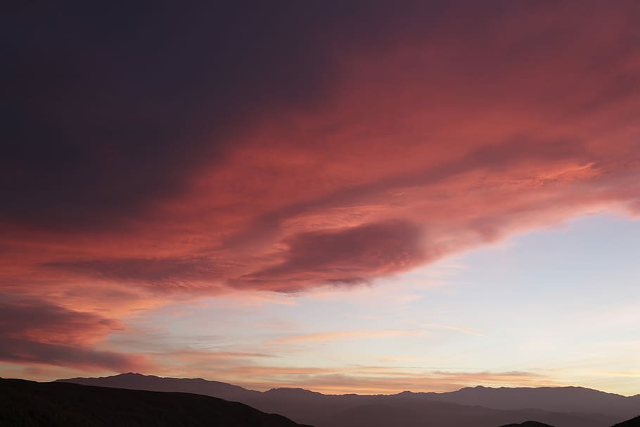 red cloudy sky during daytime, silhouette of mountain during golden hour HD wallpaper