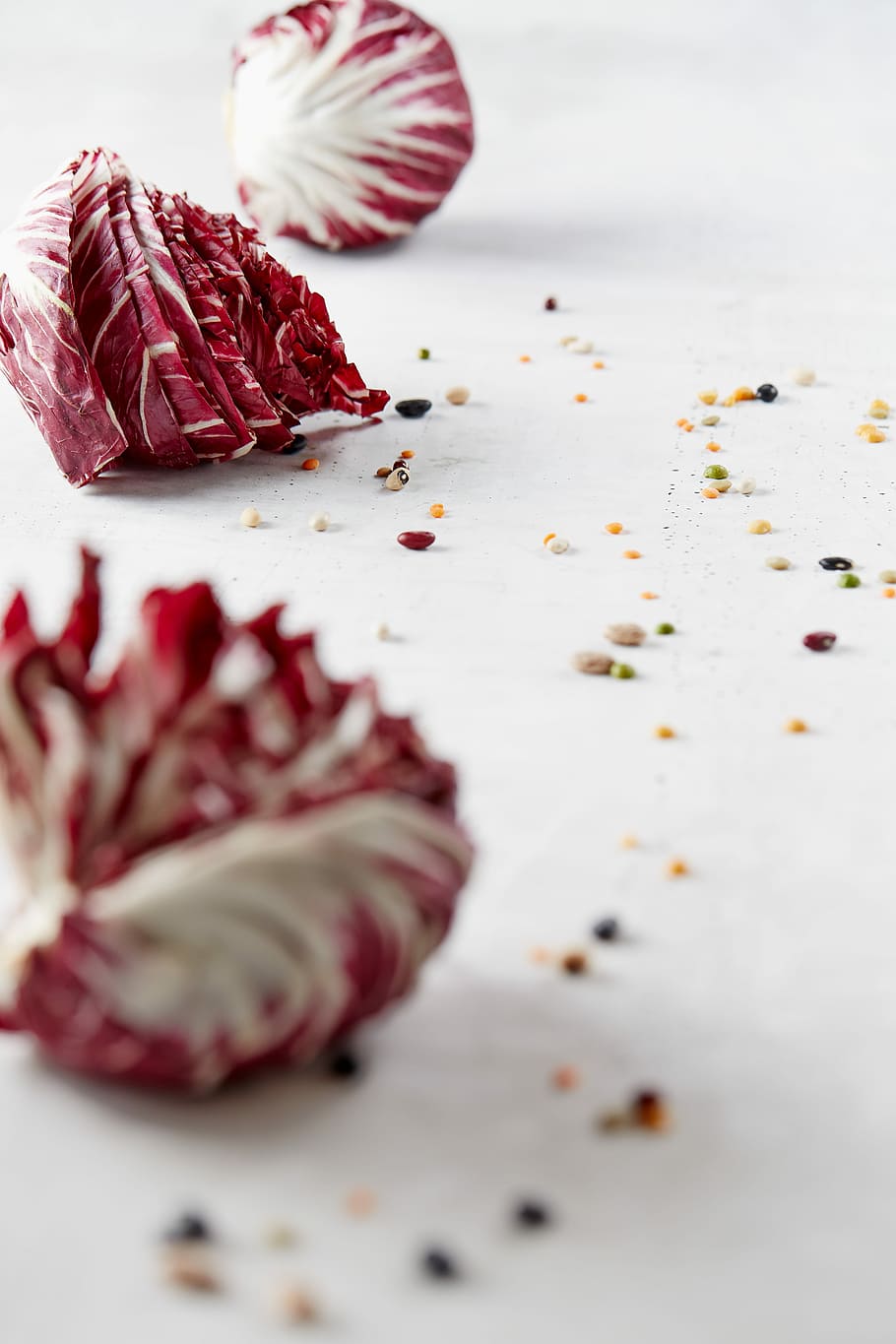 selective focus photography of red union on tabletop, sliced red and white spices HD wallpaper