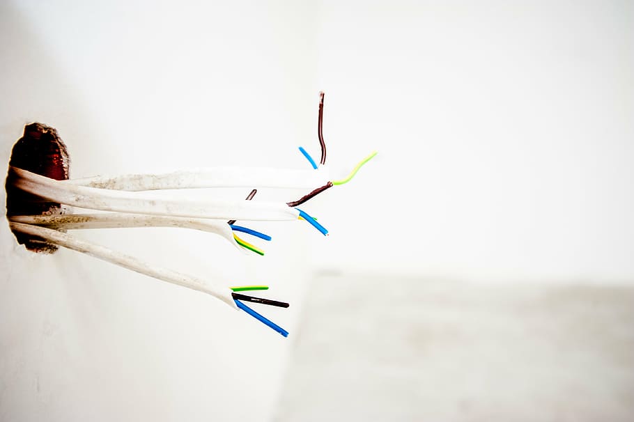 four white cable wires on hole, cables, electric, wall, electricity HD wallpaper