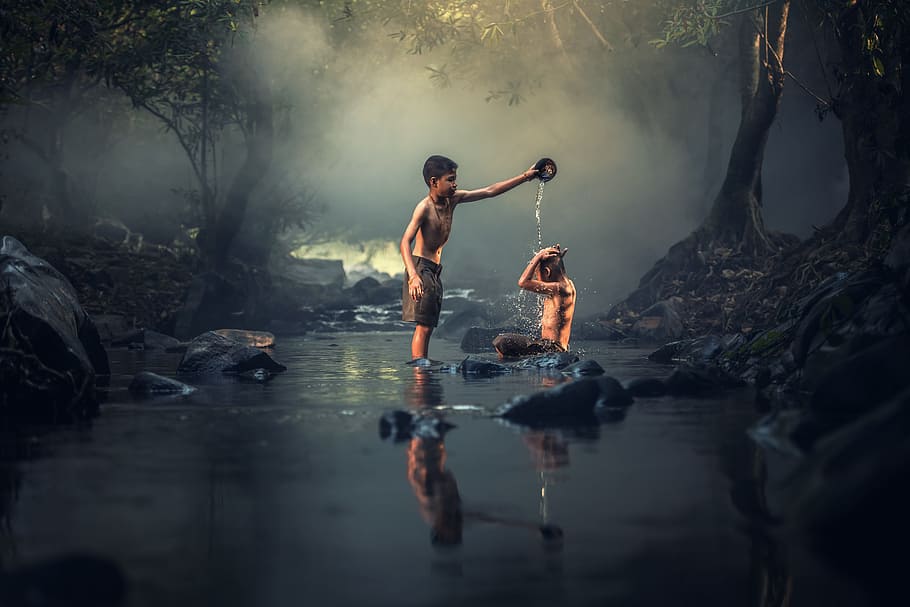 boy pouring water on person while on the river, asia, boys, creek