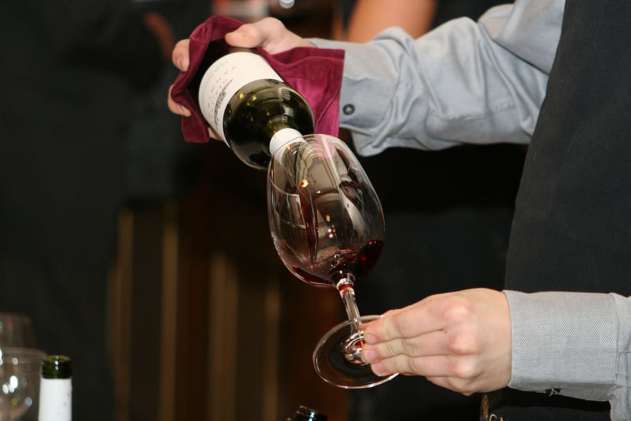 person pouring wine in goblet, bottles, sects, ice, celebration HD wallpaper