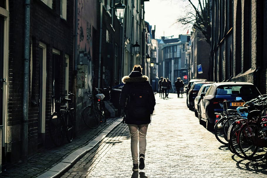 Person walking down the streets of Utrecht, Netherlands, alley, HD wallpaper